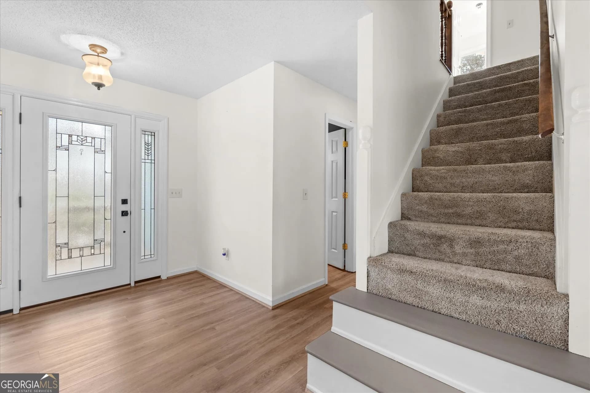 7349 S Mitchell Ct — photo 29 of 58