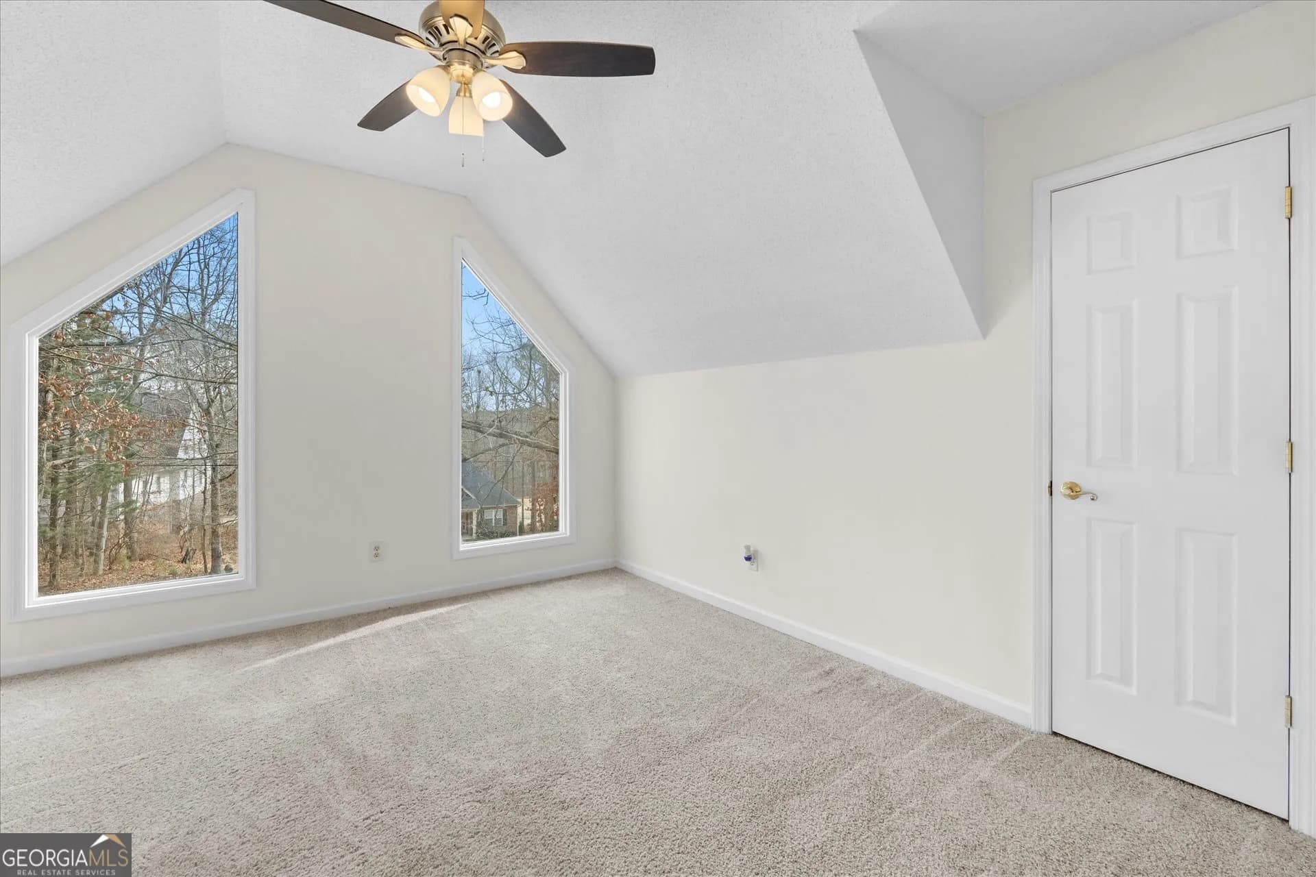 7349 S Mitchell Ct — photo 34 of 58