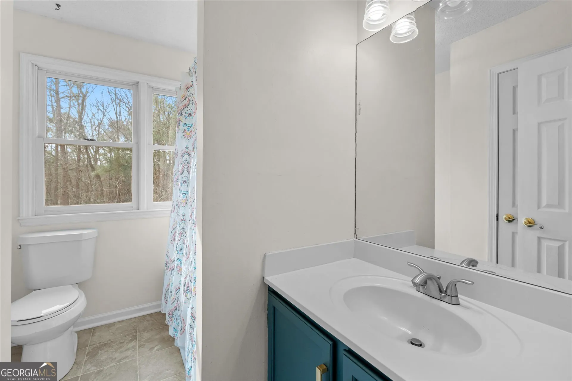 7349 S Mitchell Ct — photo 32 of 58