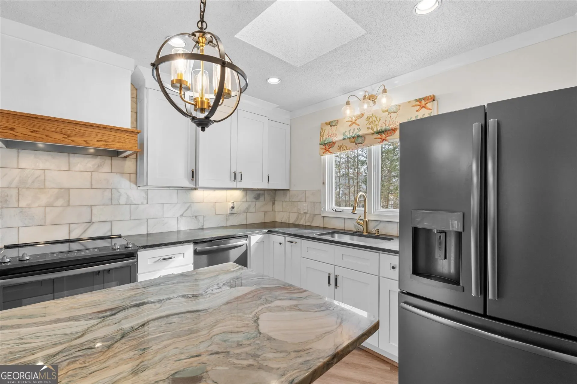 7349 S Mitchell Ct — photo 12 of 58