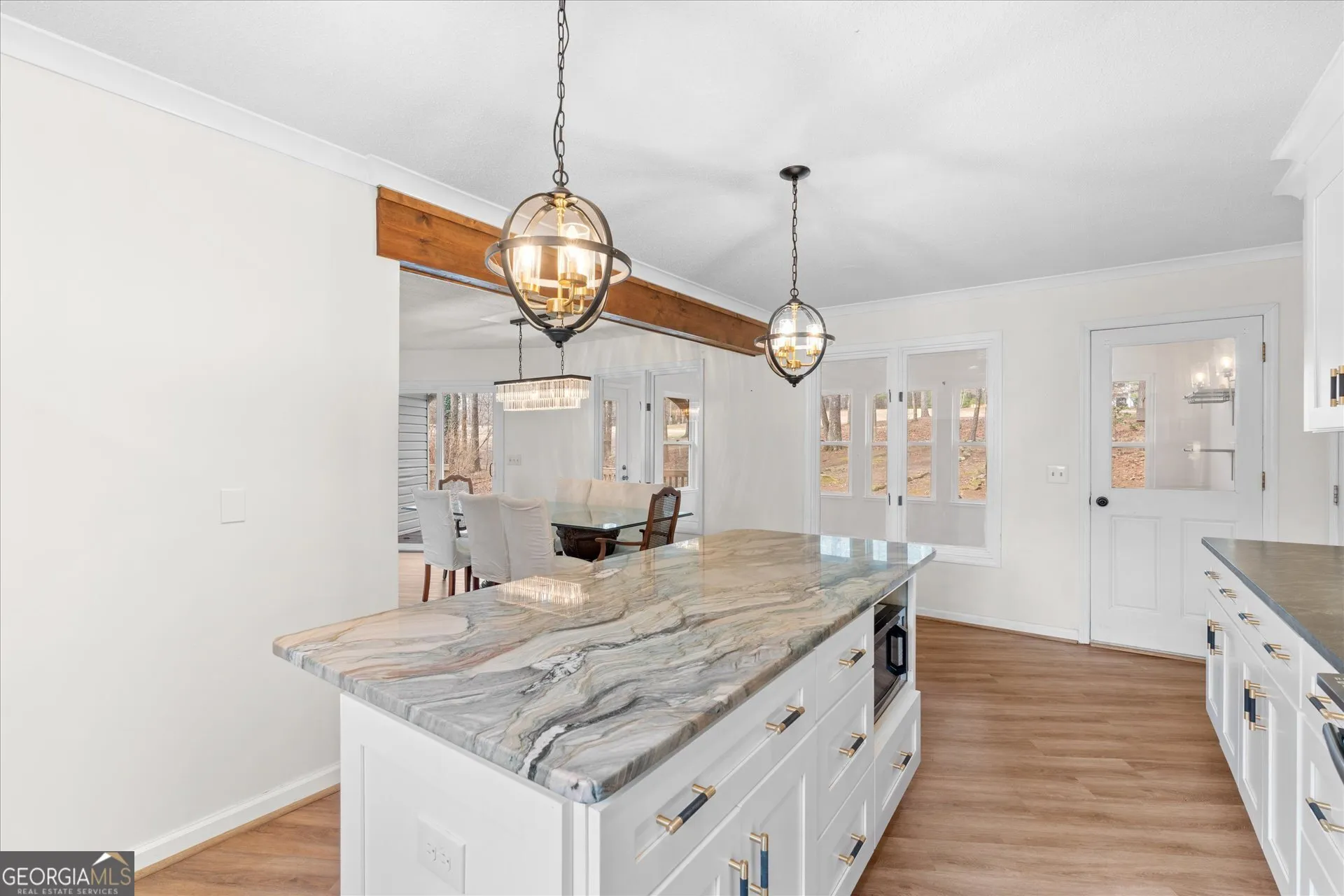 7349 S Mitchell Ct — photo 11 of 58