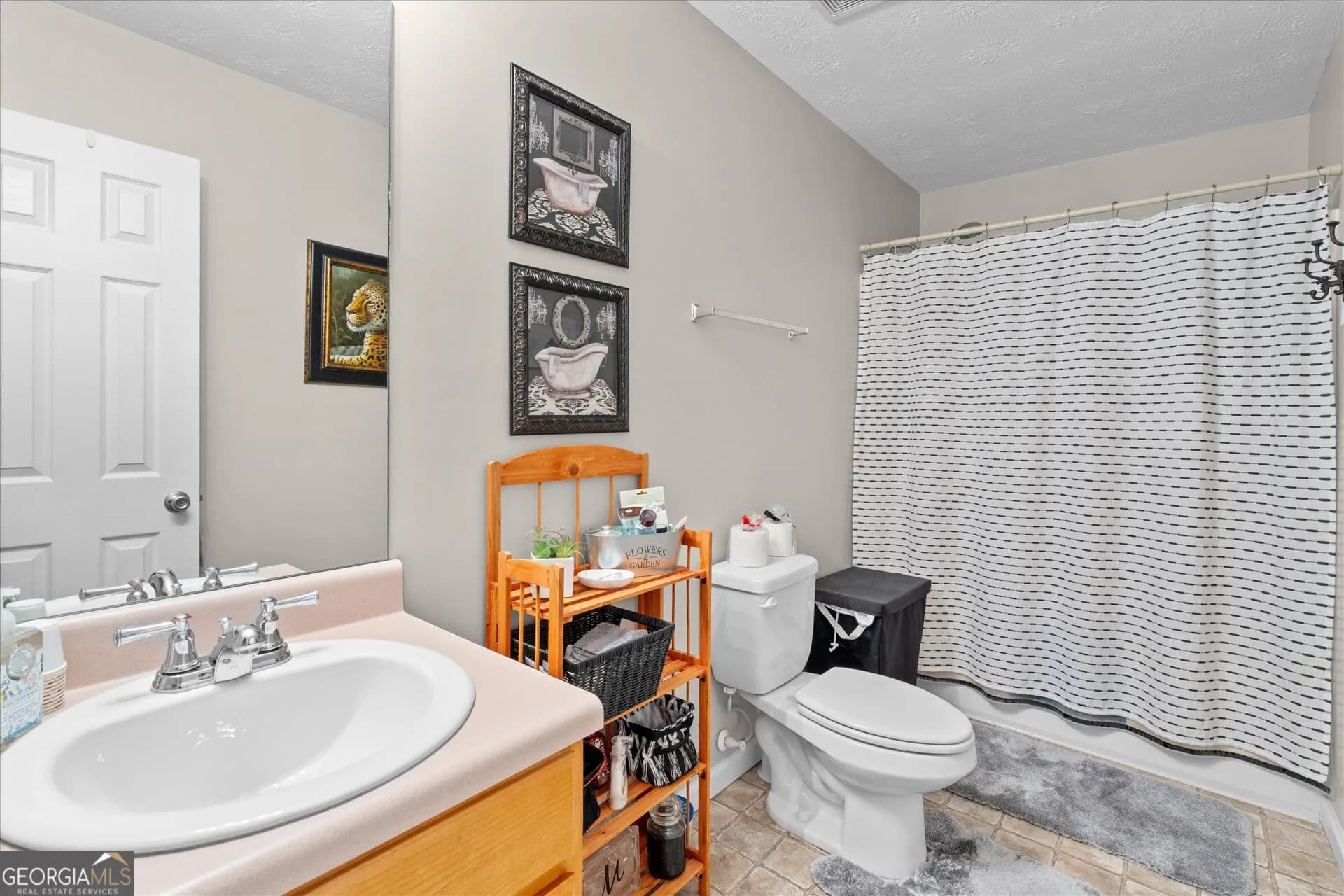 7338 S Mitchell Ct — photo 16 of 28