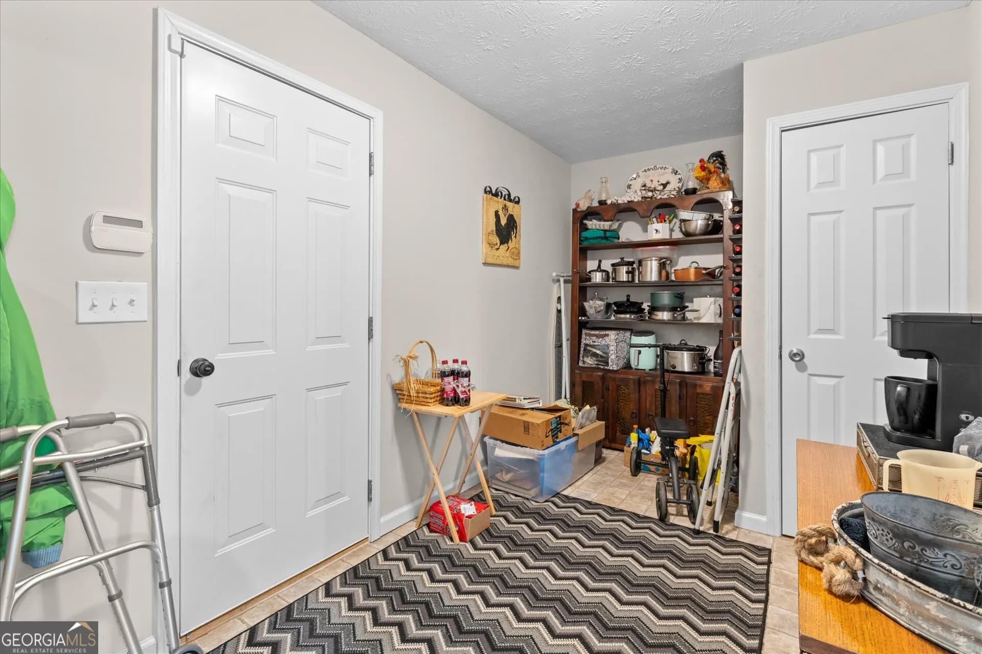 7338 S Mitchell Ct — photo 6 of 28