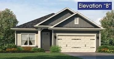 View of front of property featuring board and batten siding, driveway, an attached garage, and a front lawn