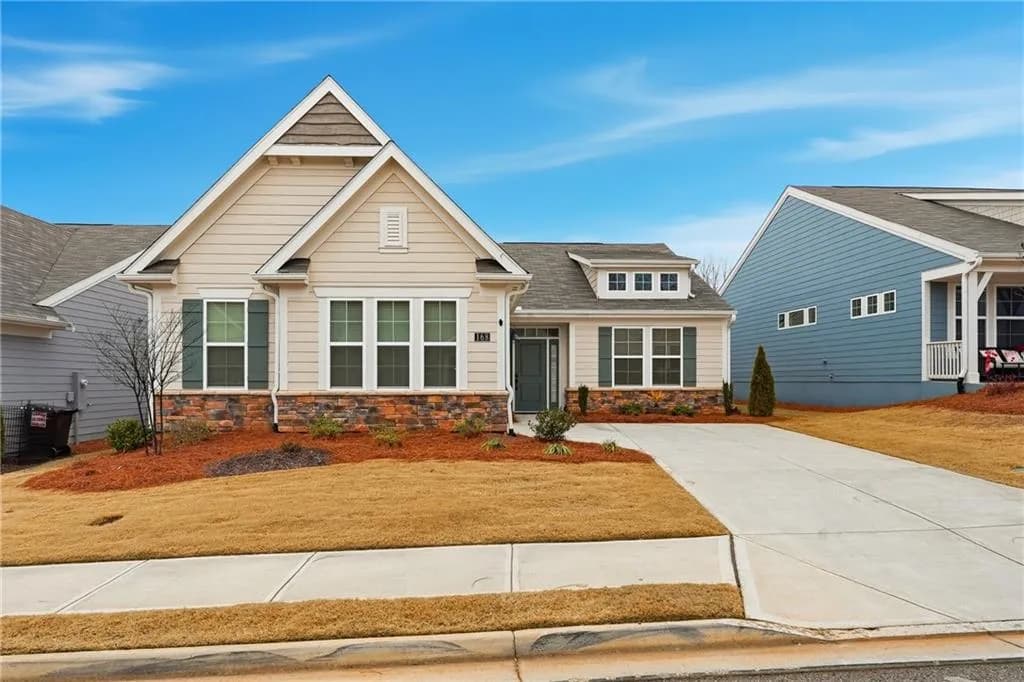 This beautifully maintained home in the gated Poplar Place 55+ community offers the perfect blend of modern comfort and easy living.