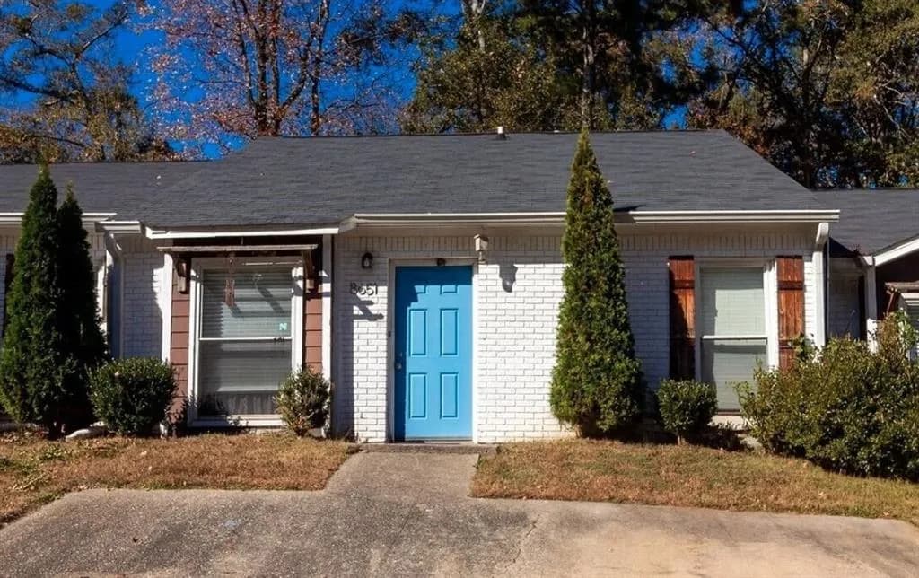 View of front of property featuring brick siding