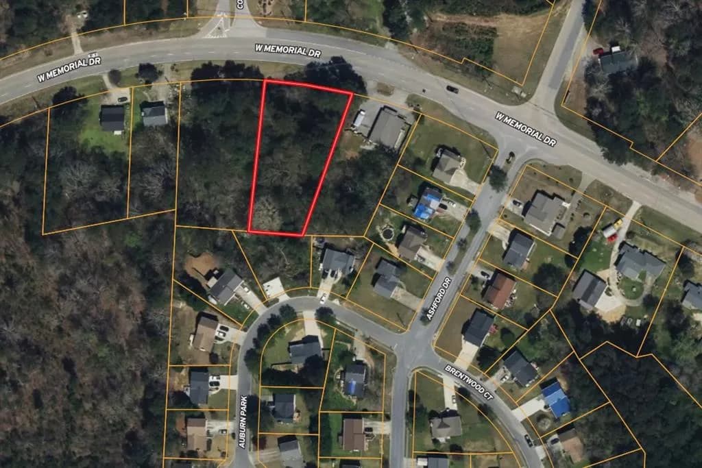 Aerial overview of property's location featuring property parcel outlined