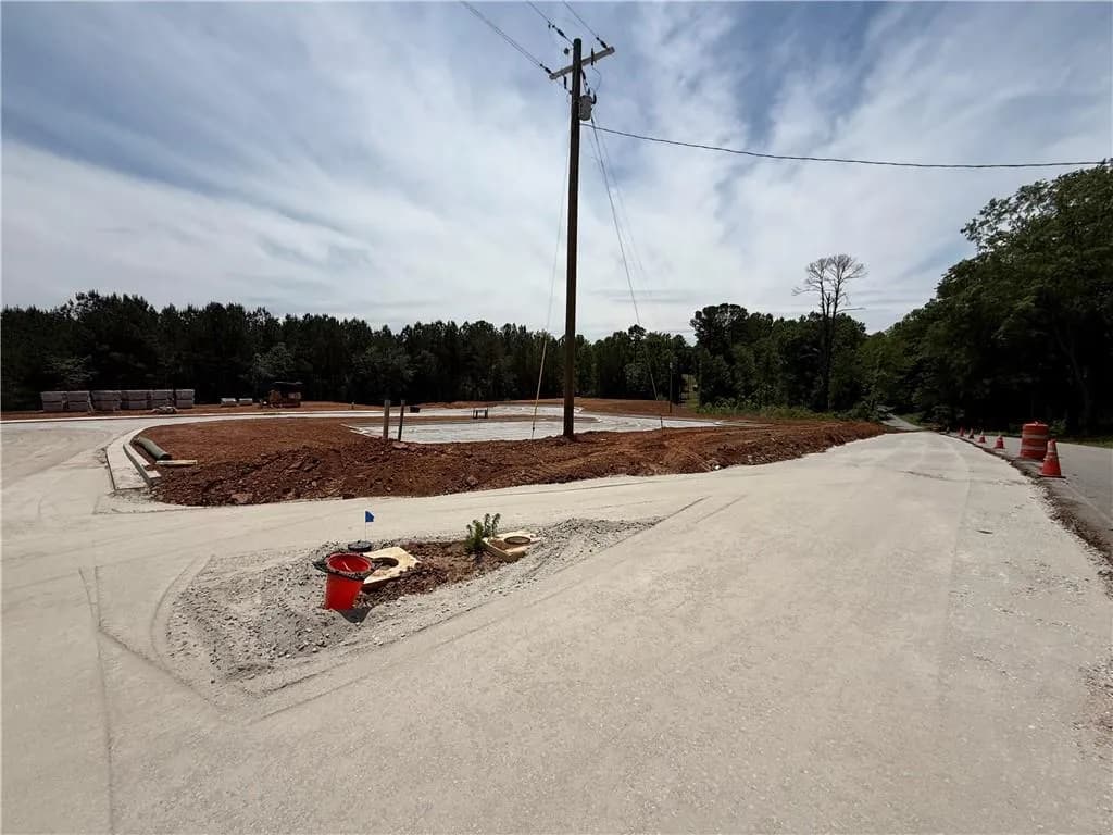 68-unit approved Townhome Development close to the University of West Georgia. Overview of deceleration lane, future mail kiosk and picklelball area.
