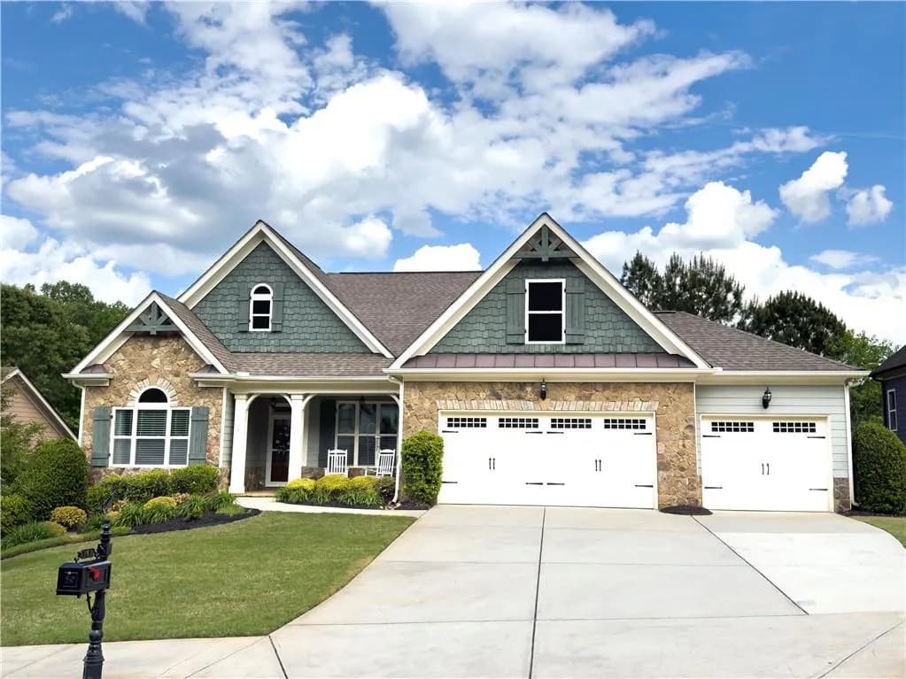 Front view of 161 Dorys Way, with view of the spacious 3 car garage